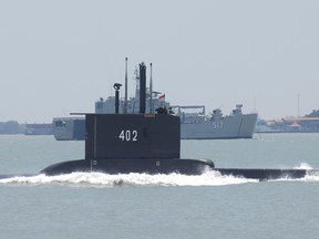 This undated photo shows the Indonesian Cakra class submarine KRI Nanggala 402 setting out from the naval base in Surabaya