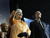 Queen Elizabeth II and Prince Philip wave to the crowd during a centennial celebration in Saskatoon, May 19, 2005. The royal couple were touring Alberta and Saskatchewan to help each province celebrate its 100th year in Confederation.