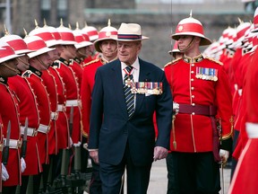 Prince Philip inspects an honour guard from the 3rd Battalion of The Royal Canadian Regiment at the Ontario Legislature in Toronto on April 27, 2013.
