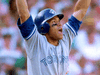 Toronto Blue Jay Roberto Alomar celebrates after hitting a home run off of Oakland A's Dennis Eckersley in the ninth inning in Game 4 of the American League Championship Series, October 11, 1992.