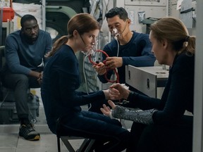 From left, Shamier Anderson, Anna Kendrick, Daniel Dae Kim and Toni Collette in Stowaway.