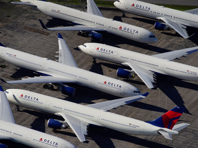 Delta Air Lines passenger planes are seen parked due to flight reductions made to slow the spread of COVID-19, at Birmingham-Shuttlesworth International Airport in Birmingham, Alabama, on March 25, 2020.