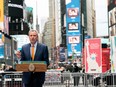 New York City Mayor Bill de Blasio speaks during the opening of the Broadway vaccination site amid the COVID-19 pandemic in New York City, April 12, 2021.