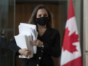 Finance Minister Chrystia Freeland walks to a news conference in Ottawa, on April 19, before delivering the government's first budget since the COVID-19 pandemic began.