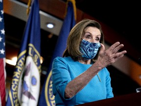 U.S. House Speaker Nancy Pelosi, a Democrat from California, wears a protective mask while speaking during a news conference at the U.S. Capitol in Washington, D.C., U.S., on Thursday, April 22, 2021.
