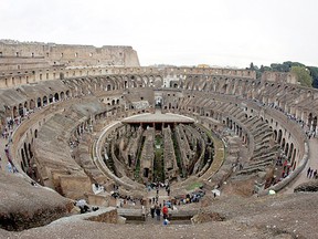 People visit Rome's ancient Colosseum, Oct. 14, 2010.