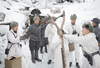 A colorized 1939 image of Finnish soldiers using a slingshot to lob grenades at Soviet soldiers in what became known as the Winter War. The conflict also saw the birth of the term Molotov cocktail. Finnish soldiers applied the moniker to makeshift firebombs in order to mock the Soviet foreign minister.