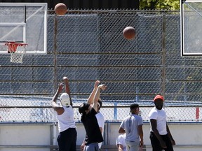 Sporting activities continue as normal at Ramsden Park in Toronto on Thursday May 13.