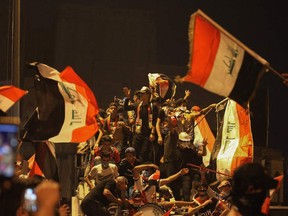 Iraqi protesters gather at Tahrir square during ongoing anti-government demonstrations in the capital Baghdad on October 31, 2019.