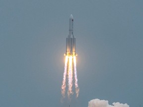 A Long March 5B rocket, carrying China's Tianhe space station core module, lifts off from the Wenchang Space Launch Center in southern China's Hainan province on April 29