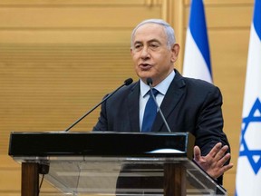 Israeli Prime Minister Benjamin Netanyahu delivers a political statement at the Knesset, the Israeli Parliament, in Jerusalem, on May 30, 2021.