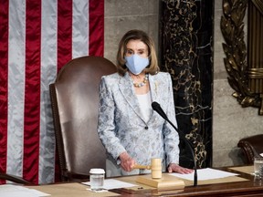 U.S. House Speaker Nancy Pelosi, a Democrat from California, bangs the gavel before the start of a joint session of Congress at the U.S. Capitol in Washington, D.C., on Wednesday, April 28, 2021.