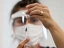 A nurse prepares a dose of the Pfizer-BioNTech COVID-19 vaccine at Ankara City Hospital in Ankara, Turkey, on April 2, 2021. 