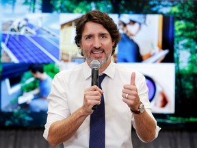 Canada's Prime Minister Justin Trudeau attends a news conference to announce a new program that offers Canadians grants of up to $5,000 for energy-saving home upgrades in Ottawa, Ontario, Canada, May 27, 2021.