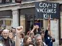 Anti-vaccine protestors in London, England. Roughly 10 per cent of Canadian adults polled said a flat out 