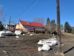 Homes damaged by historic levels of flooding are seen in Fort Simpson, Northwest Territories on Thursday May 20.