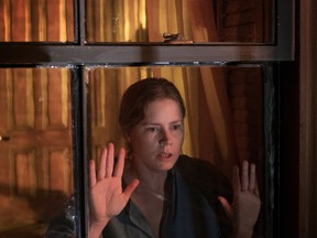 Amy Adams, just where you'd expect her to be, in The Woman in the Window.