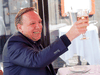 Quebec Premier François Legault raises his glass to Quebecers during a happy hour drink with his wife Isabelle Brais on a patio in Montreal on Friday, May 28, 2021, when patios were allowed to reopen across the province.