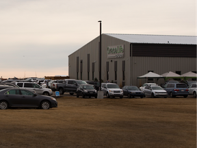 Cars parked outside Gracelife Church near Edmonton on Sunday, March 28, 2021 as Pastor James Coates returns after spending 33 days in jail for disobeying public health orders.