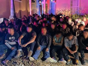 Officers discovered 68 migrants living in a stash house without any PPE.
