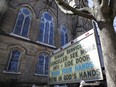 A sign promoting hand washing stands outside a closed church during the global outbreak of coronavirus disease in Toronto