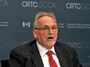 CRTC Chair Ian Scott is being accused of bias in his decision on internet wholesale rates.