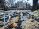 Crosses of remembrance for loved ones lost to the COVID-19 pandemic at Camilla Care Community Mississauga Long-Term Care home, Tuesday, March 9, 2021.