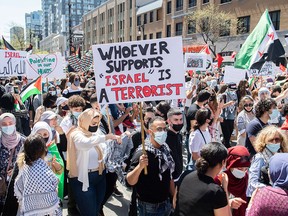 Demonstrators take part in an anti-Israel protest in Montreal on May 15, 2021.