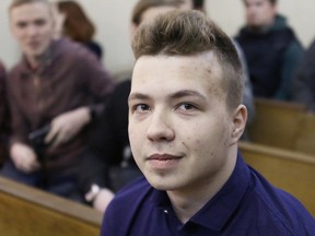 Opposition activist Roman Protasevich waits before the beginning of a court hearing in Minsk, Belarus April 10, 2017.