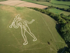 The Cerne Abbas giant stands out with lines carved into the hillside and filled with local chalk.