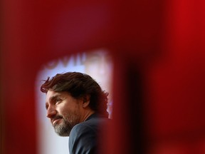 Prime Minister Justin Trudeau listens to a question during a news conference in Ottawa on April 30, 2021.