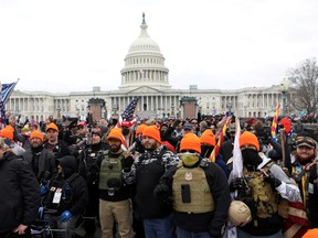 Members of the Proud Boys and other supporters of former U.S. president Donald Trump gather in front of the U.S. Capitol to protest against the certification of the 2020 U.S. presidential election results by the U.S. Congress, in Washington, D.C., on Jan. 6.