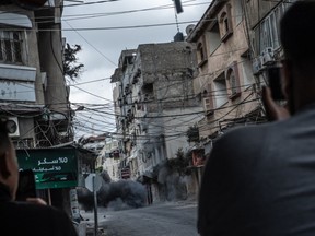 An air strike on a commercial building in Gaza City on May 13, 2021 in Gaza City, Gaza.