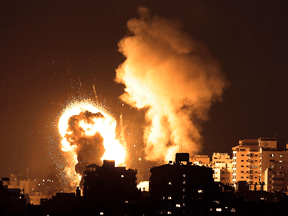 Fire billows from Israeli air strikes in the Gaza Strip, controlled by the Palestinian Islamist movement Hamas, on May 10, 2021.