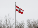 A Hitler youth flag flies over a business near Boyle, Alberta. It was taken down after a visit from the RCMP on May 5, 2021.