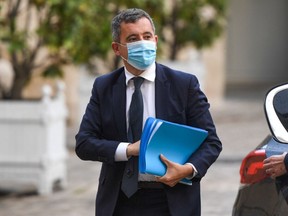 French Interior Minister Gerald Darmanin arrives at a meeting with French police unions at the Hotel Matignon in Paris on May 10, 2021. - After the deaths of a police employee killed in a terror attack at the police station in Rambouillet on April 30, 2021, and a police officer killed in Avignon on May 5, 2021 during an anti-drug operation, French police unions call for a "citizens' march" in Paris on May 19, 2021.