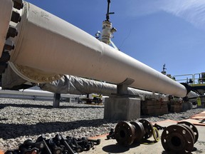 In this June 8, 2017, file photo, fresh nuts, bolts and fittings are ready to be added to the east leg of the Line 5 pipeline near St. Ignace, Mich.