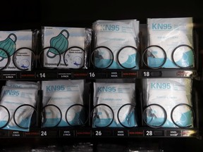 KN95 masks are shown for sale in a vending machine at the airport during the outbreak of the coronavirus disease (COVID-19) in San Diego, California, U.S., February 4, 2021.