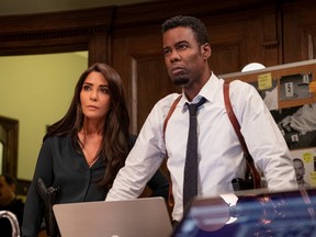 Marisol Nichols and Chris Rock in Spiral: From the Book of Saw.