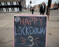 A sidewalk sign reflects some of the frustration of Calgarians amid the latest COVID restrictions. Alberta had the highest percentage of people who responded  in a poll that they've lost trust in the federal and provincial governments.