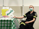 A Peel Region paramedic waits to administer another dose of the Moderna COVID-19 vaccine, at a one-day pop-up vaccination clinic at the Muslim Neighbour Nexus Mosque, in Mississauga, Ont., on April 29.