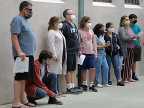 Finley Martin, 14, queues to receive a coronavirus disease (COVID-19) vaccination at a vaccine clinic for newly eligible 12 to 15-year-olds in Pasadena, California, U.S., May 14, 2021.