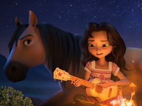Horses and music and starlight, oh my! A scene from Spirit Untamed.
