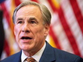 Governor Greg Abbott speaks during a press conference where he signed Senate Bills 2 and 3 at the Capitol on June 8, 2021 in Austin, Texas.