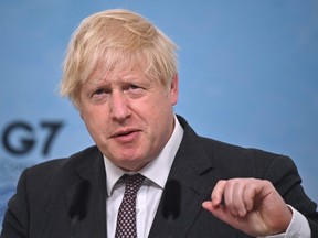 British Prime Minister Boris Johnson takes part in a press conference on the final day of the G7 summit in Carbis Bay on June 13, 2021 in Cornwall, United Kingdom.