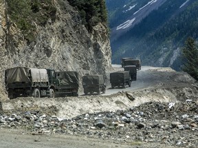 An Indian army convoy, carrying reinforcements and supplies, travels towards Leh through Zoji La, a high mountain pass bordering China on June 13, 2021 in Ladakh, India.