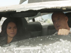 They survived this? Michelle Rodriguez and Vin Diesel in F9.