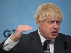 Britain's Prime Minister Boris Johnson speaks during a news conference at the end of the G7 summit in Carbis Bay, Cornwall, Britain, on June 13, 2021.