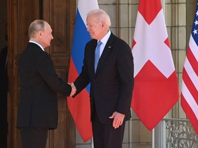 U.S. President Joe Biden and Russian President Vladimir Putin shake hands as they arrive at Villa La Grange in Geneva, Switzerland, for the start of their summit on June 16, 2021.