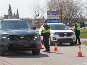 Ontario Provincial Police check travellers entering Ontario from Quebec as new COVID-19 measures take effect Monday, April 19.